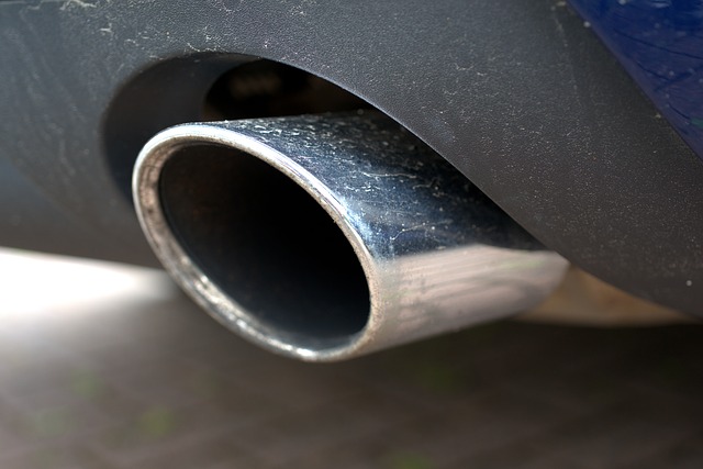 Carbon emissions - car exhaust pipe